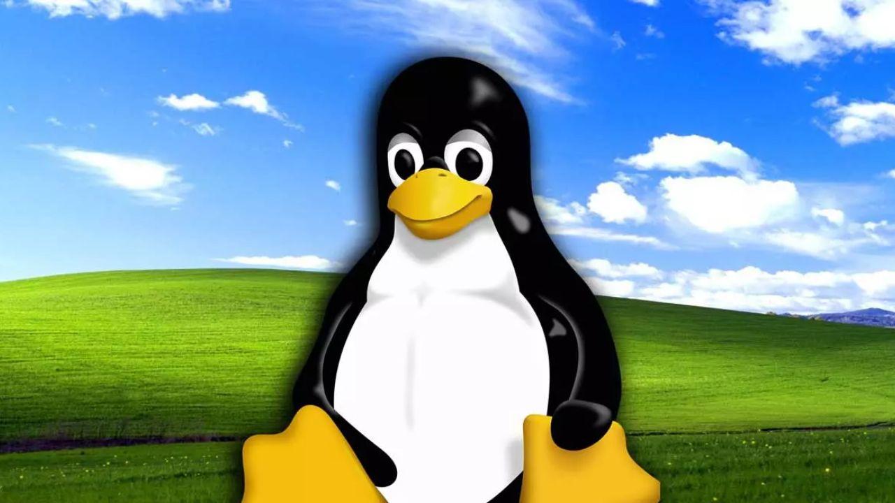 Símbolo de Linux sobre el fondo de escritorio de Windows XP.